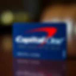 Visual representation of the Capital One logo with a secured credit card.