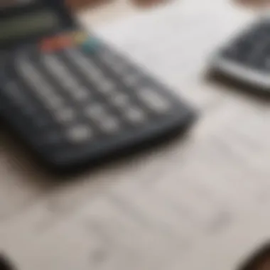 A close-up of financial documents with a calculator